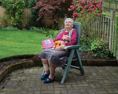   Ruth is 93 and arrived on a Kindertransport from Cologne.     Pictured in her garden with her recent autobiography and the soft animals she still makes to give to others.    - © Michelle Sank